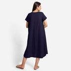Back View of a Model wearing Navy Blue Cotton Welt Pocket Shift Dress