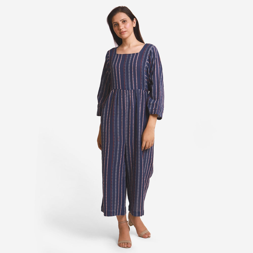 Front View of a Model wearing Navy Blue Crinkled Cotton Flared Jumpsuit