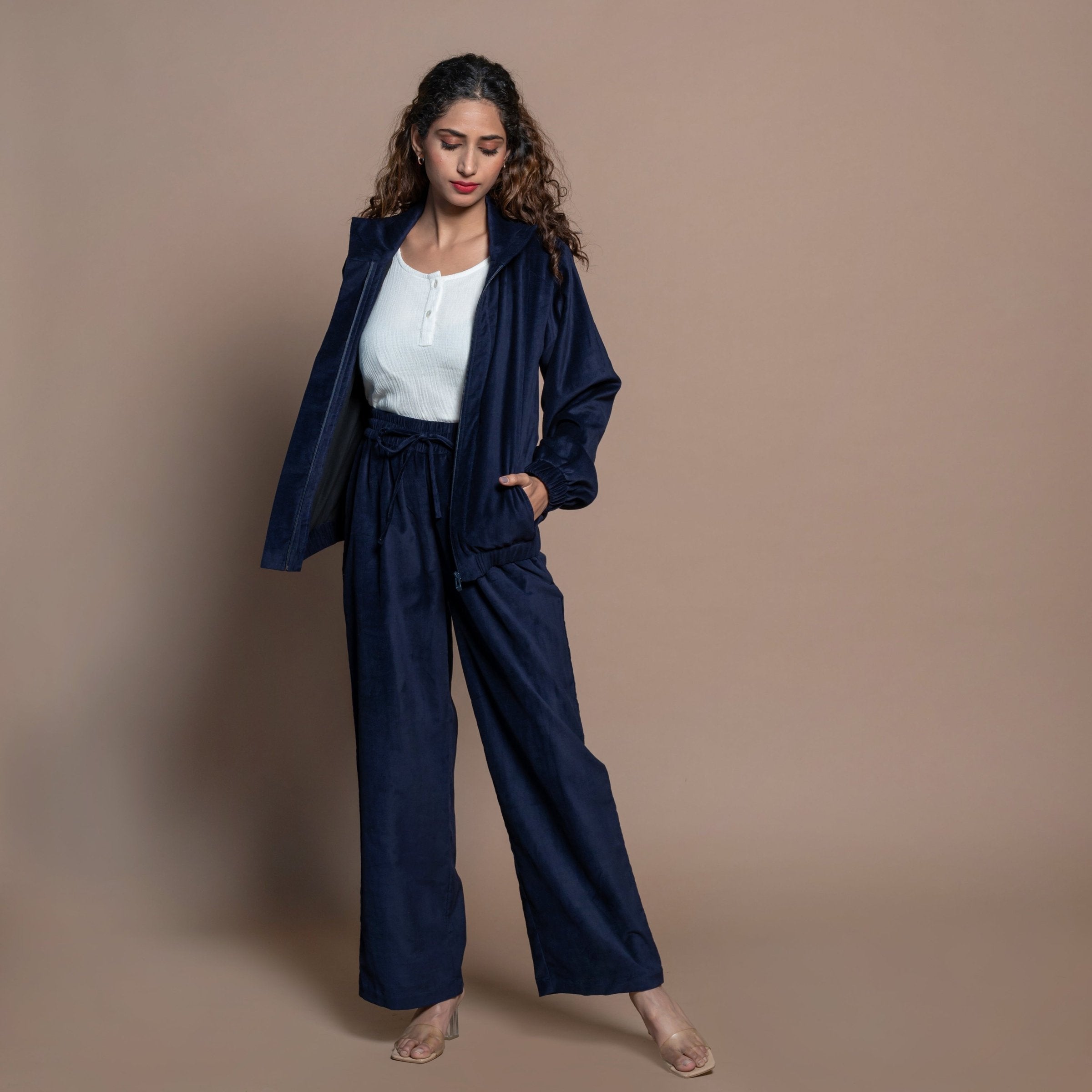 Front View of a Model wearing Navy Blue Cotton Velvet Elasticated High-Rise Pant