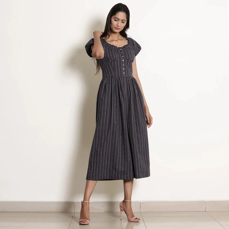 Front View of a Model wearing Navy Blue Striped Frilled Neck Flared Jumpsuit