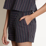 Front Detail of a Model wearing Navy Blue Striped Paneled Shorts