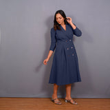 Right View of a Model wearing Navy Blue Warm Cotton Waffle Pleated Button-Down Midi Dress