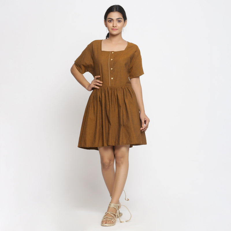 Front View of a Model wearing Oak Brown Cotton Button-Down Gathered Dress