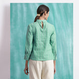 Back View of a Model wearing Ocean Green Handspun 100% Cotton Mirror Work Blouse Top