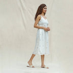 Right View of a Model wearing Off-White Aztec Handspun Cotton Jamdani Midi Slip Dress
