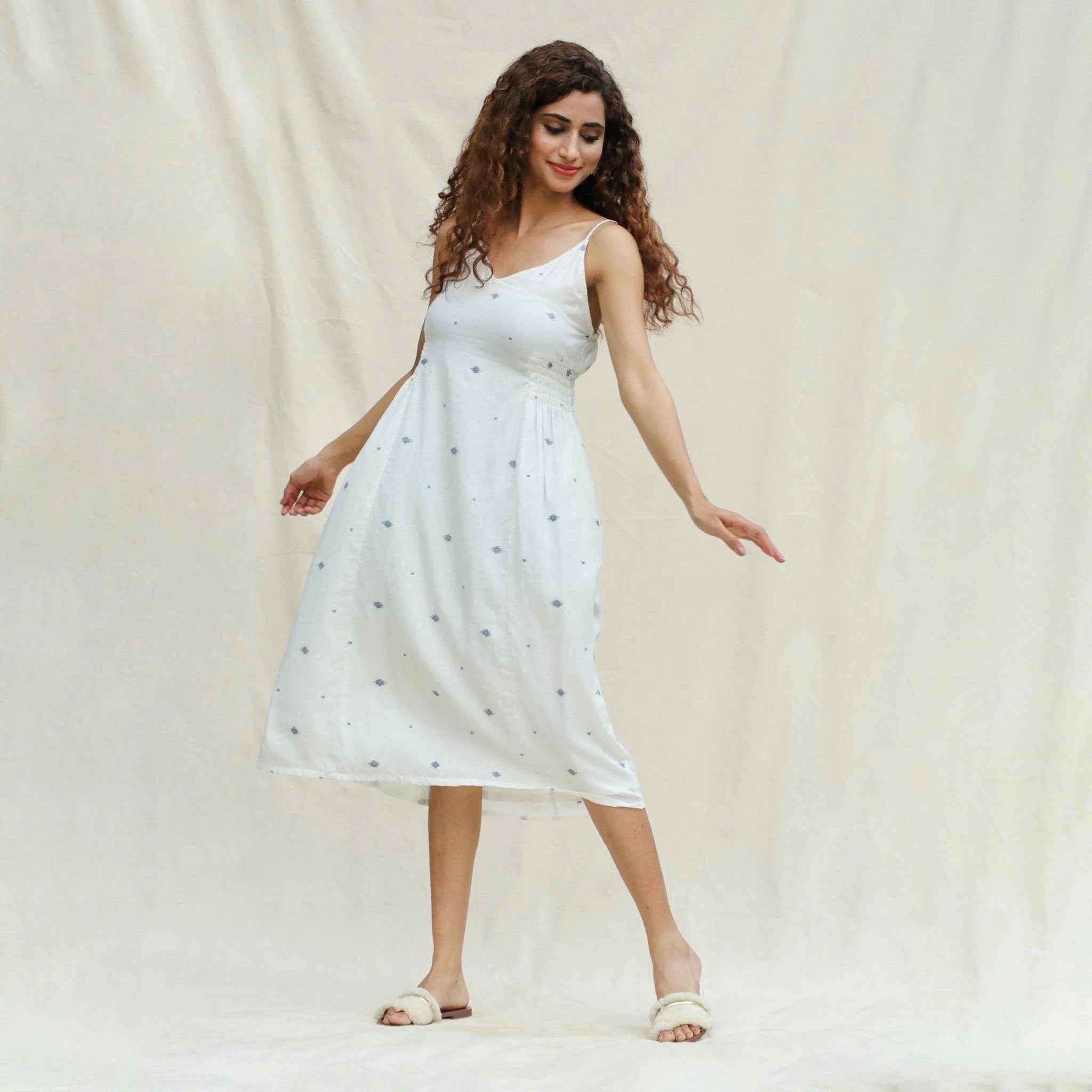 Front View of a Model wearing Off-White Aztec Handspun Cotton Jamdani Midi Slip Dress
