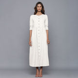 Front View of a Model wearing Off-White Cotton Flannel Gathered Dress