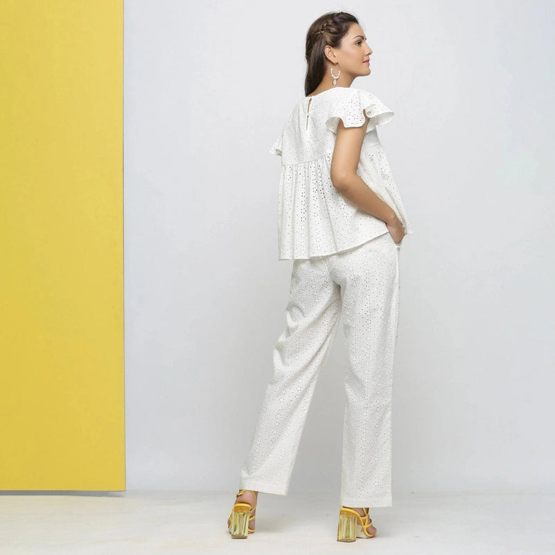 Back View of a Model wearing Off-White Cotton Schiffli Yoked Top