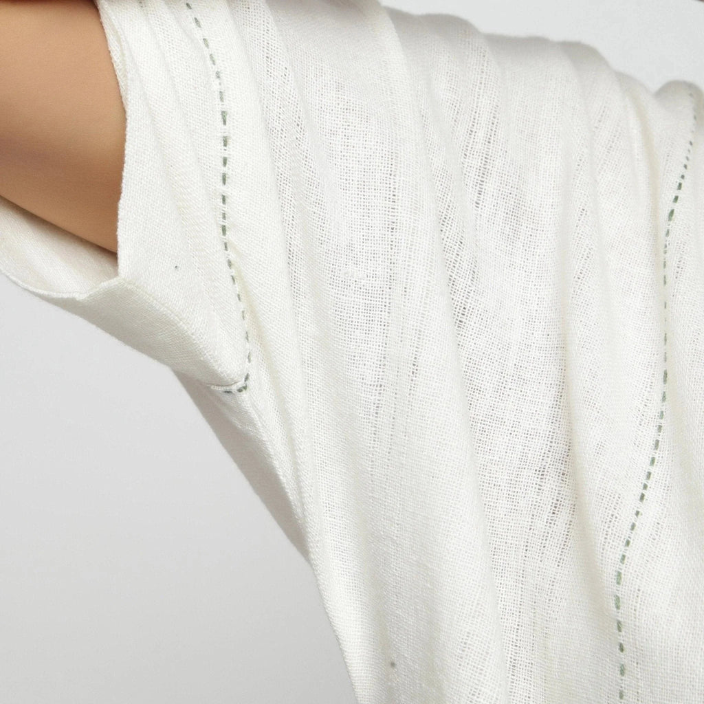 Close View of a Model wearing Off-White Hand Embroidered Tunic Top