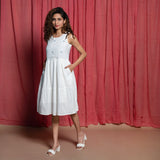 Front View of a Model wearing Off-White Handspun Cotton Jamdani Knee Length Gathered Dress