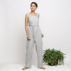Front View of a Model wearing Off-White Handwoven Cotton Jumpsuit