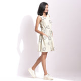 Right View of a Model wearing Off-White Handwoven Ikat Paneled Dress