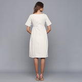 Back View of a Model wearing Off-White Paneled Cotton Flannel Dress