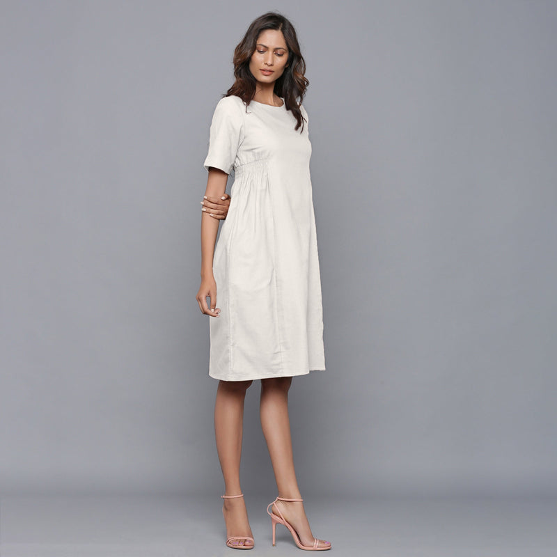 Right View of a Model wearing Off-White Paneled Cotton Flannel Dress