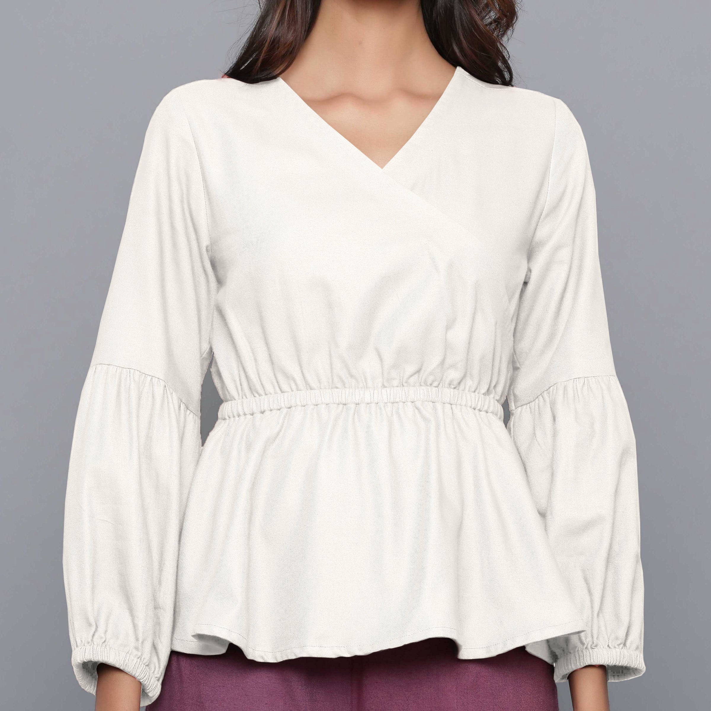 Front Detail of a Model wearing Off-White V-Neck Flannel Peplum Top