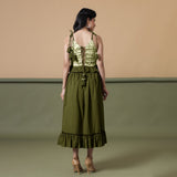 Back View of a Model wearing Olive Green A-Line Ruffled Cotton Skirt
