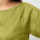 Front Detail of a Model wearing Olive Green Boat Neck Half Sleeve Cotton Top