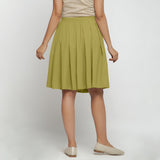 Back View of a Model wearing Olive Green Cotton Flax Pleated Skirt