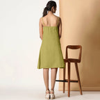 Back View of a Model wearing Olive Green Cotton Flax Strappy Slit Dress