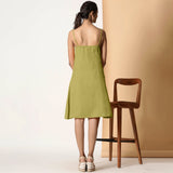 Back View of a Model wearing Olive Green Cotton Flax Strappy Slit Dress