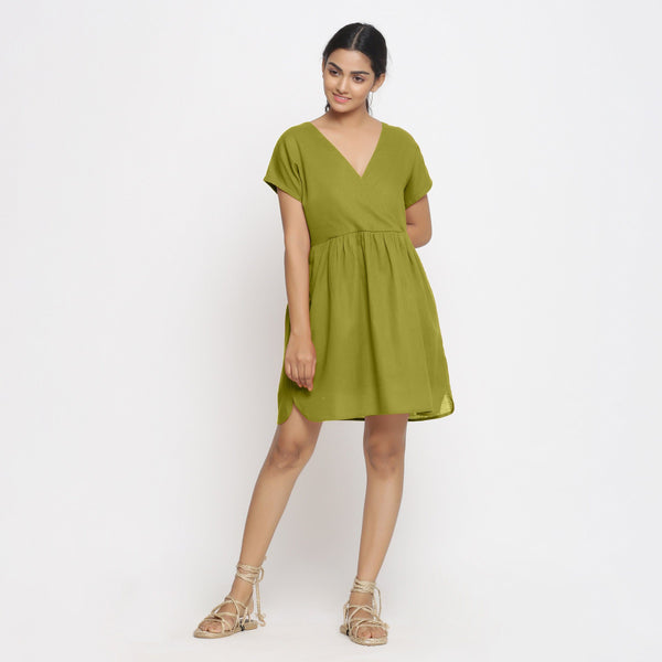 Front View of a Model wearing Olive Green Cotton Solid Wrap Dress