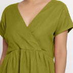 Front Detail of a Model wearing Olive Green Cotton Solid Wrap Dress