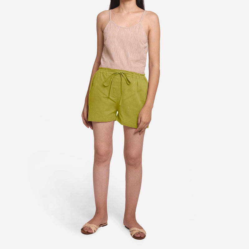 Front View of a Model wearing Olive Green Cotton Straight Shorts