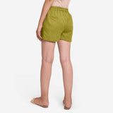 Back View of a Model wearing Olive Green Cotton Straight Shorts