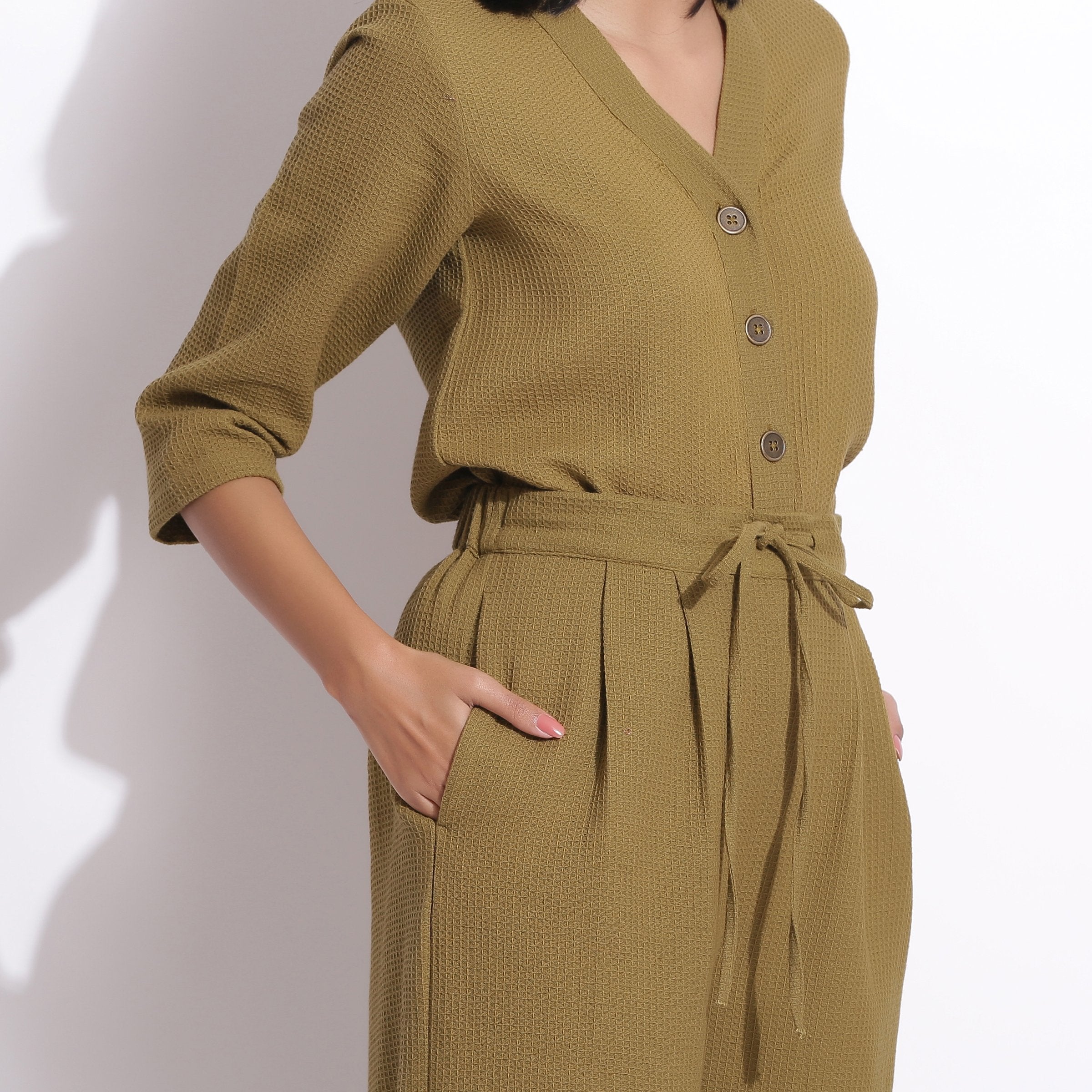 Front Detail of a Model wearing Olive Green Warm Cotton Waffle Button-Down Top