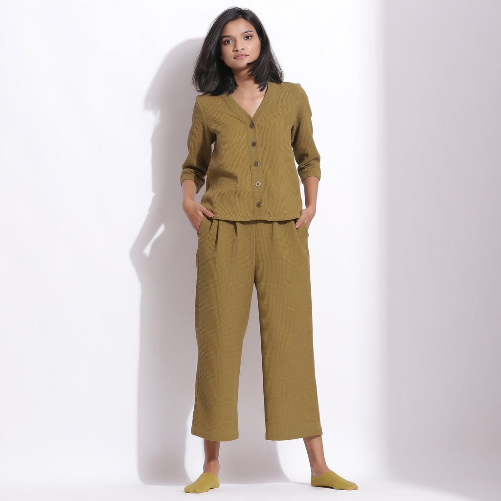 Front View of a Model wearing Olive Green Warm Cotton Waffle Button-Down Top