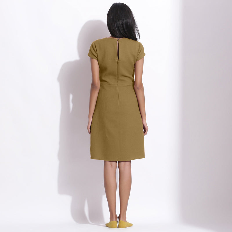 Back View of a Model wearing Olive Green Cotton Waffle V-Neck Dress