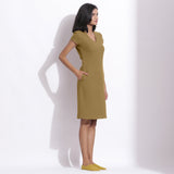 Right View of a Model wearing Olive Green Cotton Waffle V-Neck Dress