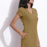 Right Detail of a Model wearing Olive Green Cotton Waffle V-Neck Dress