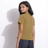 Back View of a Model wearing Olive Green Cotton Waffle Woven T-Shirt