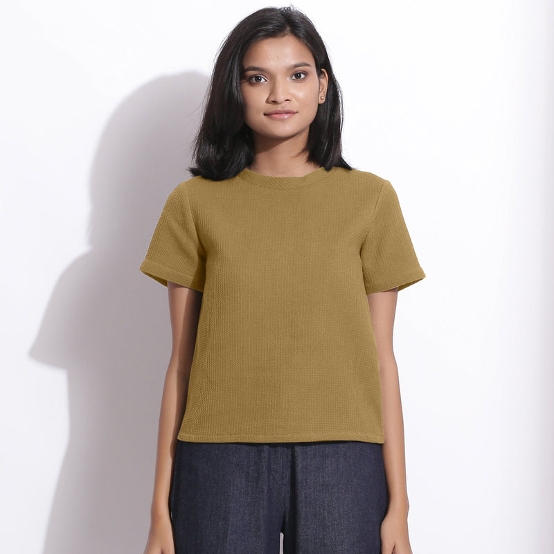 Front View of a Model wearing Olive Green Cotton Waffle Woven T-Shirt