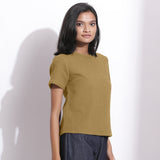Right View of a Model wearing Olive Green Cotton Waffle Woven T-Shirt
