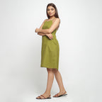 Left View of a Model wearing Olive Green Criss-Cross Cotton A-Line Dress
