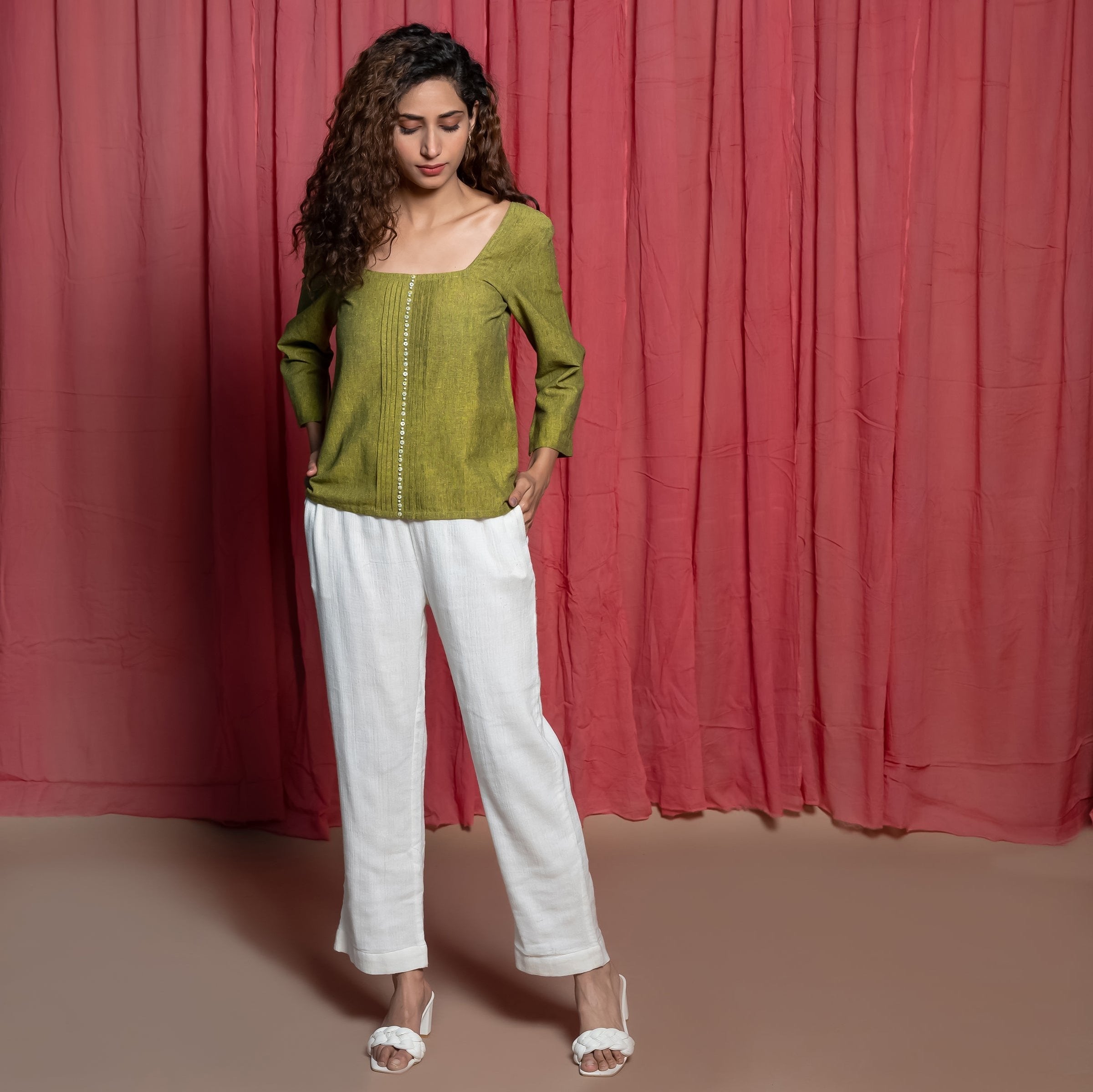 Front View of a Model wearing Olive Green Square Neck Handspun Cotton Hand Beaded Top
