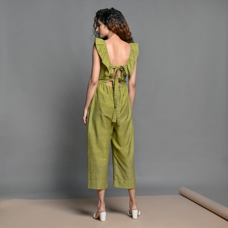 Back View of a Model wearing Olive Green Handspun Cotton Frilled Jumpsuit