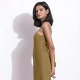 Left View of a Model wearing Olive Green Honeycomb One-Shoulder Jumpsuit