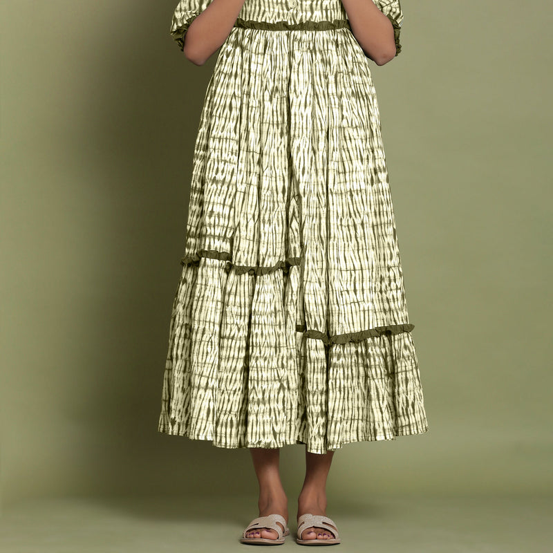 Front Detail of a Model wearing Olive Green Shibori Asymmetrical Tier Maxi Dress