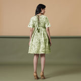 Back View of a Model wearing Olive Green Shibori Drop Shoulder Dress