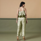 Back View of a Model wearing Olive Green Shibori Frilled Camisole Jumpsuit