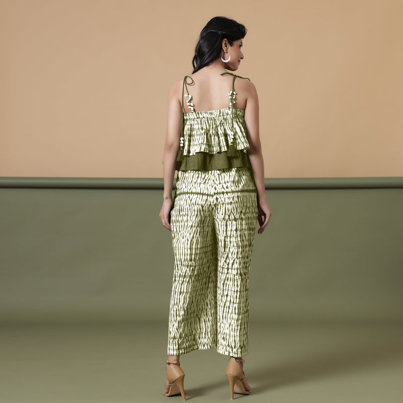 Back View of a Model wearing Olive Green Shibori Frilled Camisole Jumpsuit