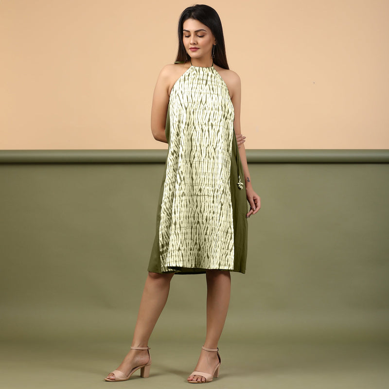 Front View of a Model wearing Olive Green Shibori Halter Neck A line Dress