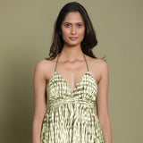 Front Detail of a Model wearing Olive Green Shibori Halter Neck Gathered Dress