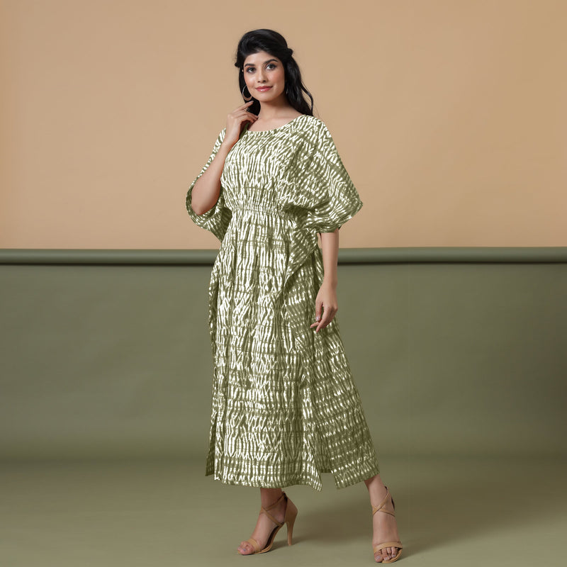 Left View of a Model wearing Olive Green Shibori Kaftan Dress