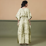 Back View of a Model wearing Olive Green Shibori V-Neck Kaftan Jumpsuit