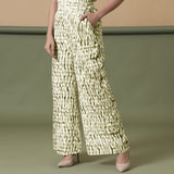 Front View of a Model wearing Olive Green Shibori Wide Legged Pant