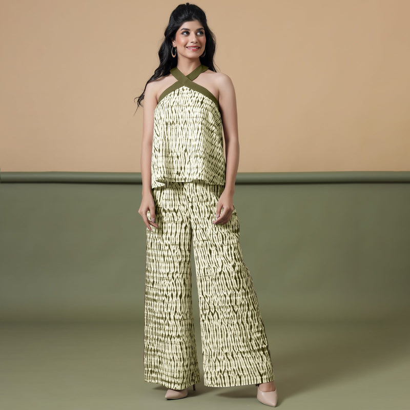 Front View of a Model wearing Olive Green Shibori Wide Legged Pant